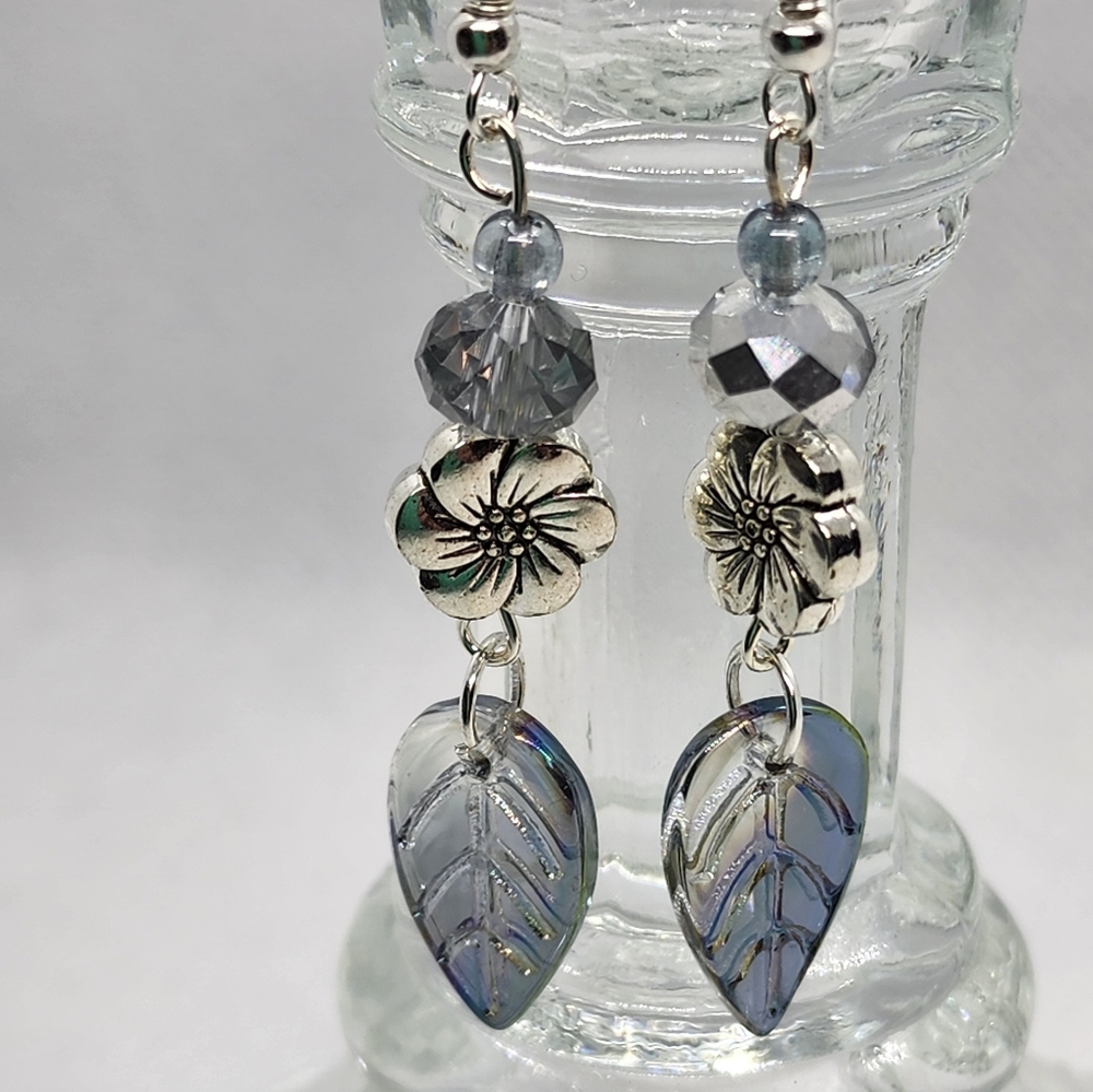 Handmade silver and blue-gray glass leaves.